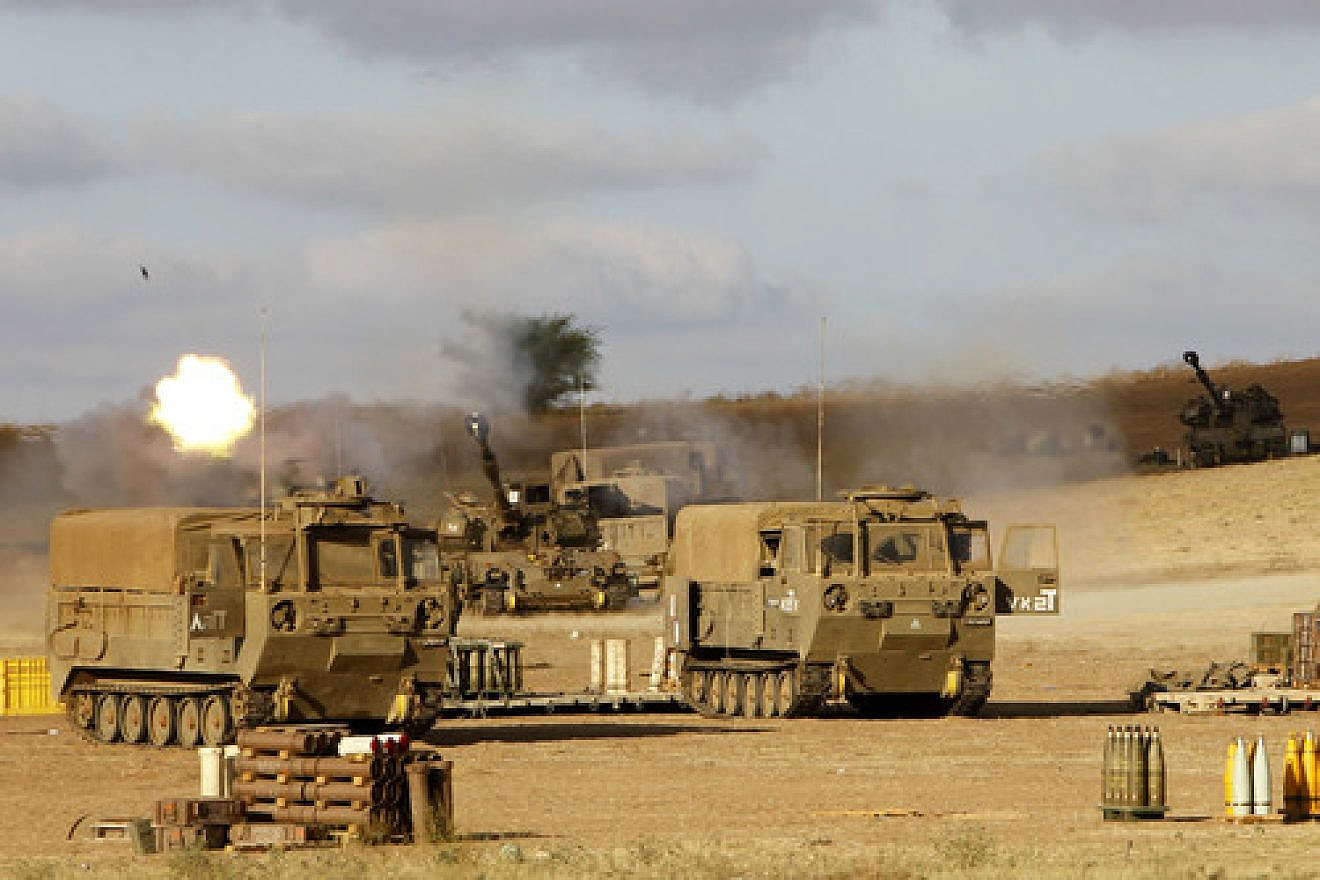 The Israel Defense Forces Artillery Corps fires shells at Gaza on July 18, 2014, after Israeli forces began a ground invasion into northern Gaza amid “Operation Protective Edge.” Credit: Miriam Alster/Flash90.