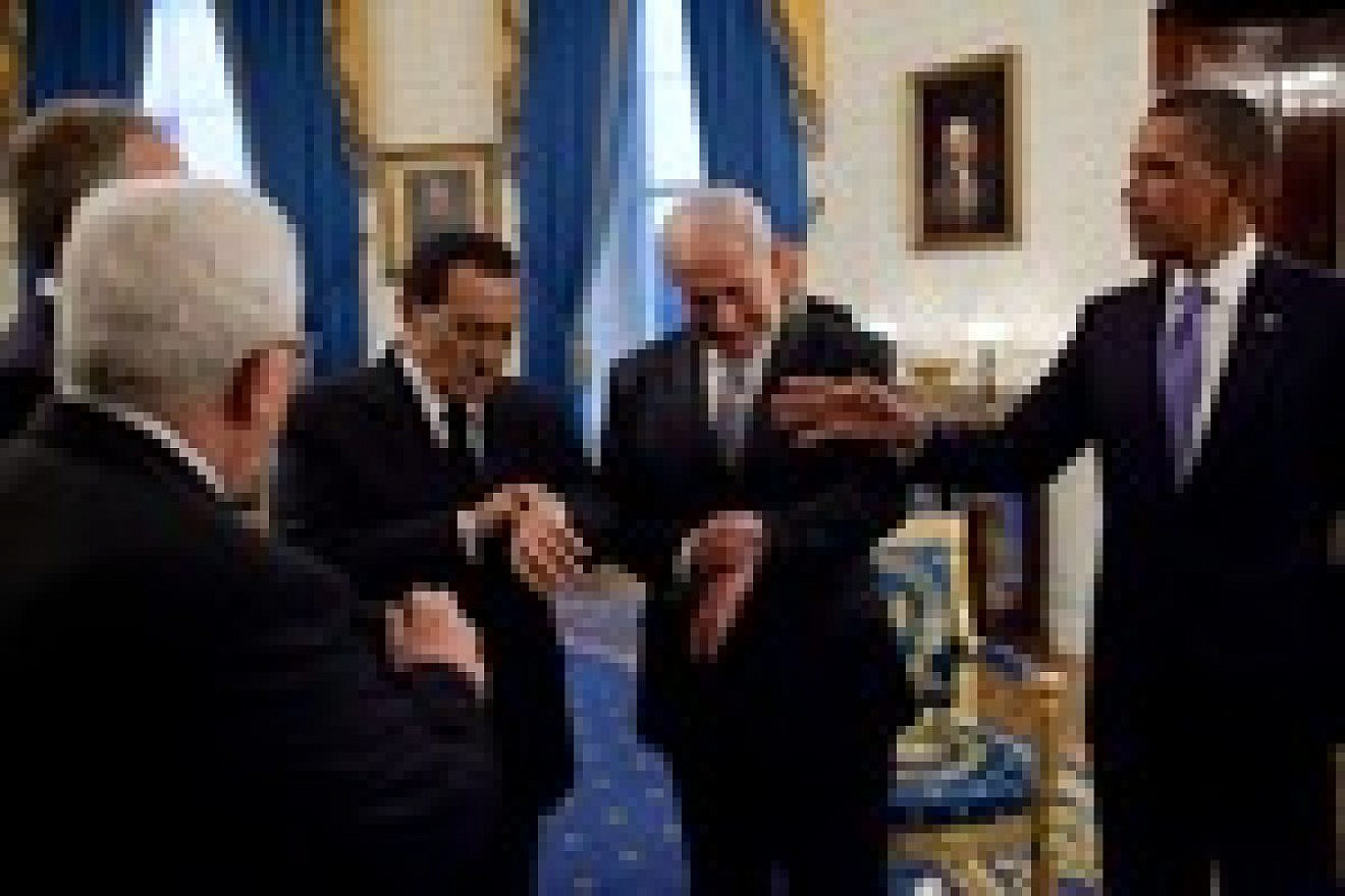 President Barack Obama (far right) with Israeli Prime Minister Benjamin Netanyahu and then Egyptian President Hosni Mubarak—both checking their watches—in September 2010 at the White House. Credit: White House.