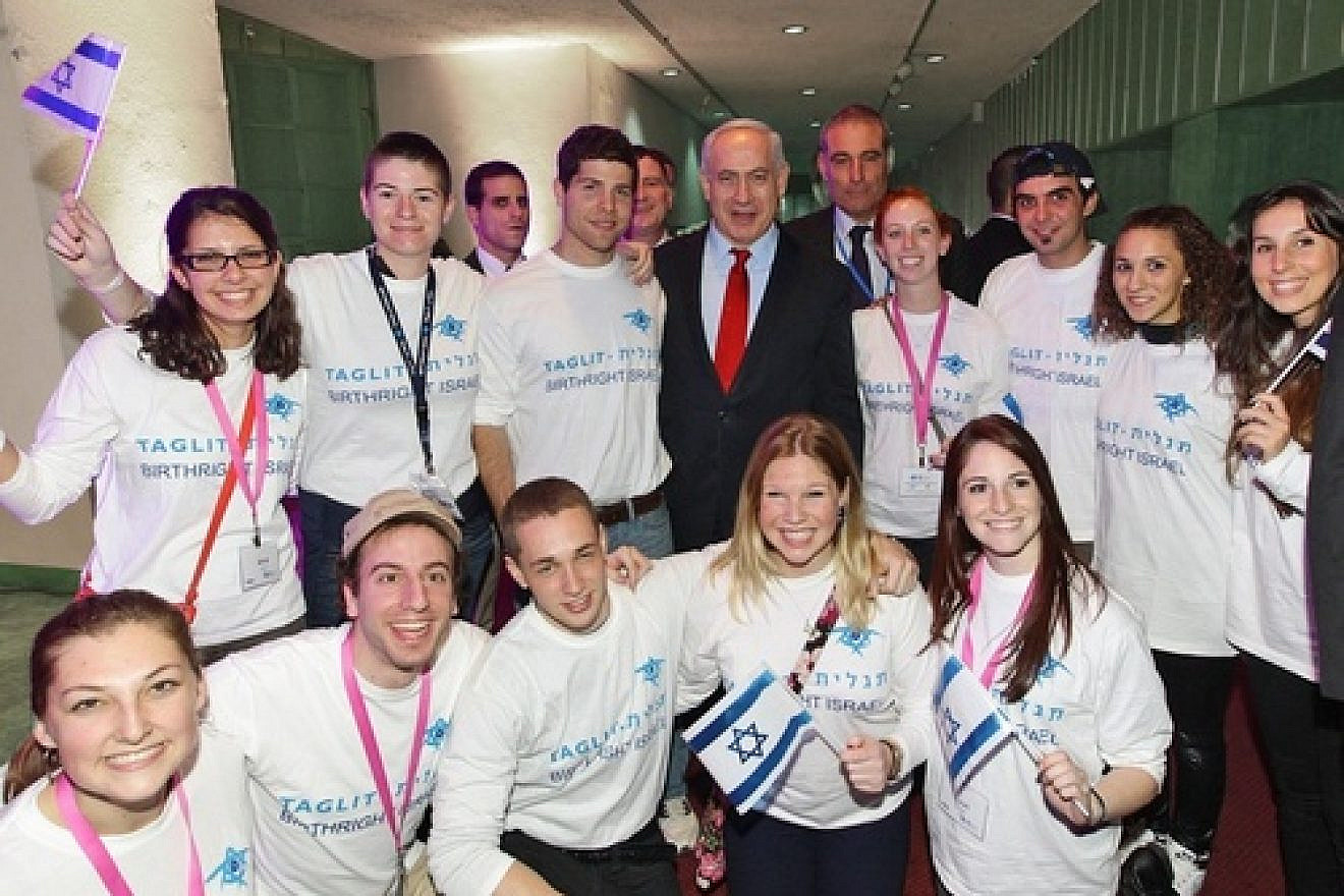 Click photo to download. Caption: Taglit-Birthright Israel trip participants with Prime Minister Benjamin Netanyahu. Credit: Taglit-Birthright Israel.