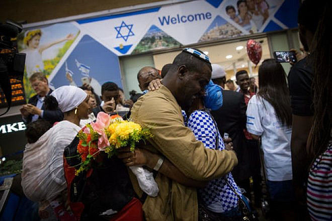 Ethiopian Jews are greeted by family members as they arrive at Israel’s Ben-Gurion Airport, as part of an aliyah flight arranged by the Jewish Agency for Israel and sponsored by the International Christian Embassy Jerusalem in June 2017. Credit: Miriam Alster/Flash90.