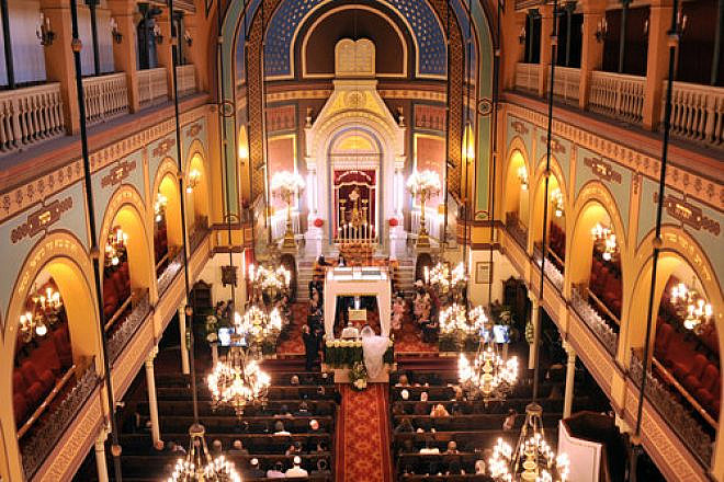 An audience in a synagogue in Paris. Credit: Serge Attal/Flash90.