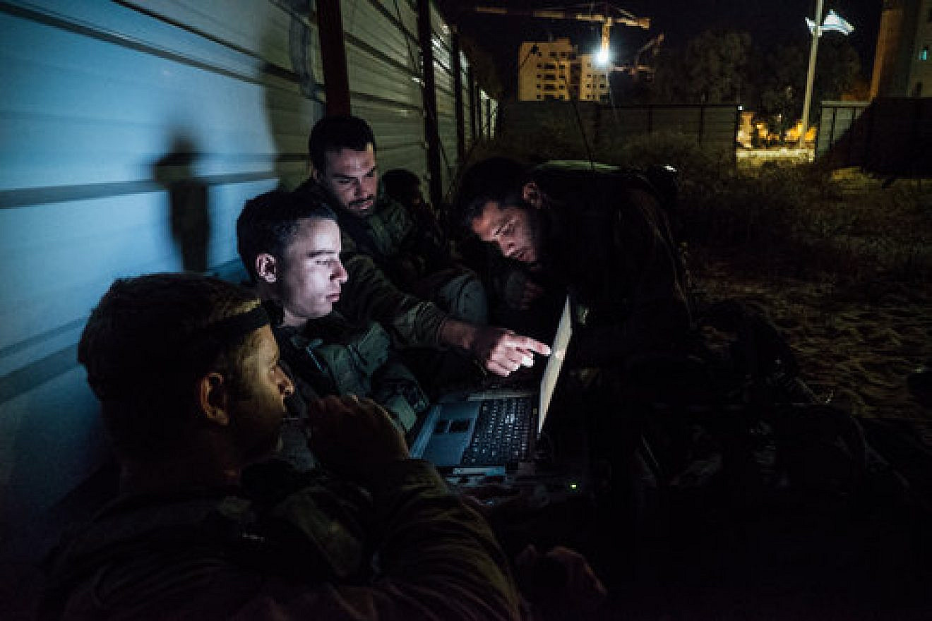 Artificial intelligence (AI) is being introduced at all levels of IDF decision-making. Pictured here, the Paratroopers Brigade during an exercise with other military units, including the elite canine unit Oketz. Credit: IDF via Flickr.