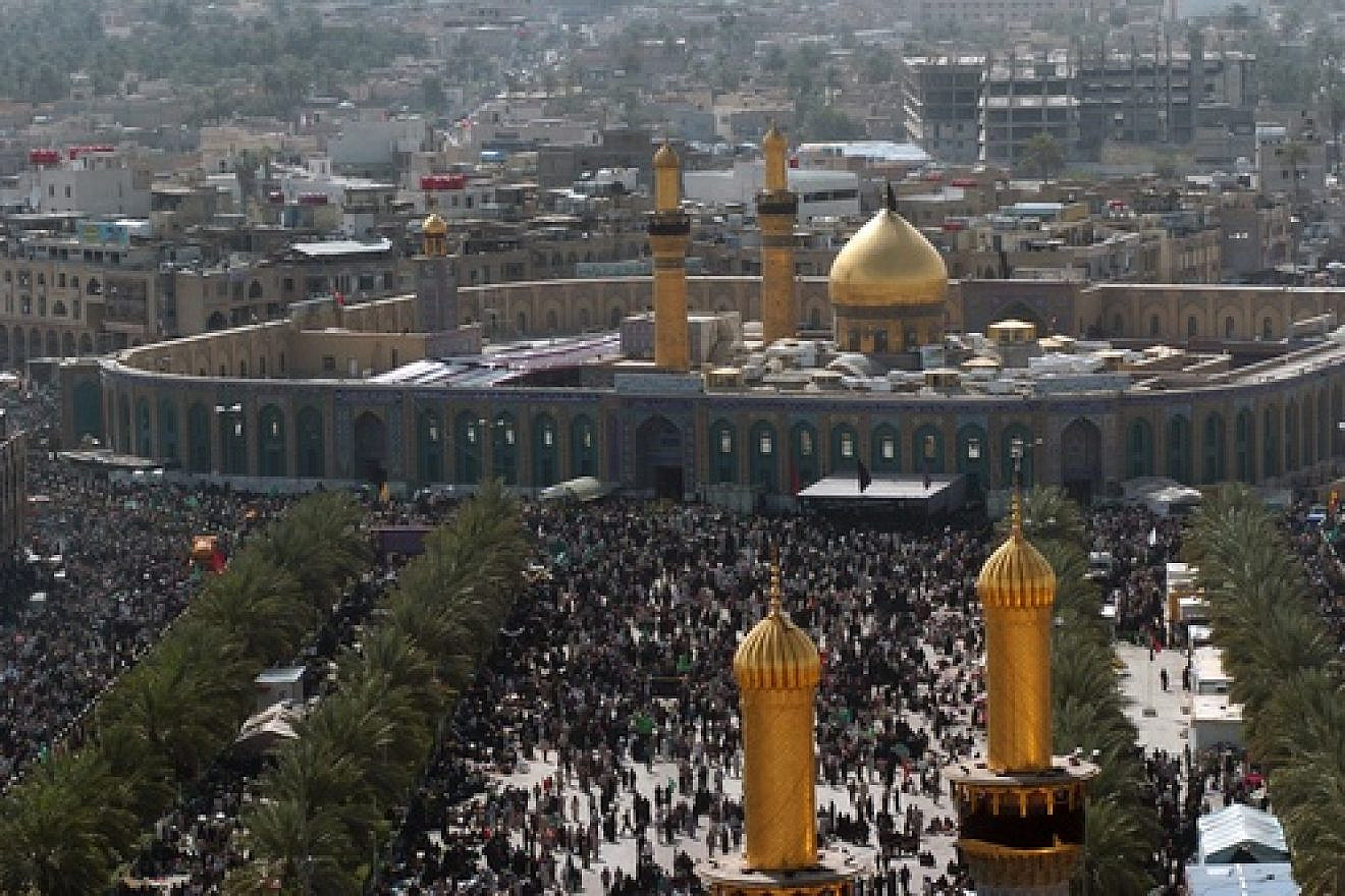 Shi’a Muslims gather around the Husayn mosque in Karbala, Iraq, after making a pilgrimage on foot during Arba'een, a 40-day period that commemorates the killing of Hussein ibn Ali, grandson of the Prophet Muhammad, and 72 of his followers at the Battle of Karbala in the year 680 B.C. That battle is seen as a source of the ongoing battle between Sunni and Shi’a Islam. Credit: SFC Larry E. Johns, USA, via Wikimedia Commons.