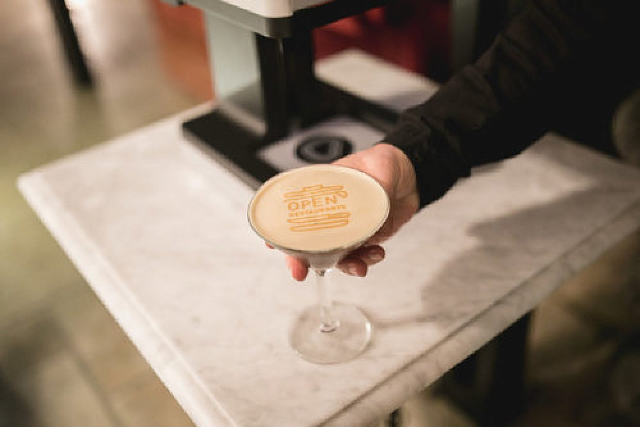 A coffee drink created by Ripples, an Israeli company that uses 3-D printing technology to produce images on froth, at the Open Restaurants urban culinary festival in Jerusalem. Credit: Tomer Foltyn.