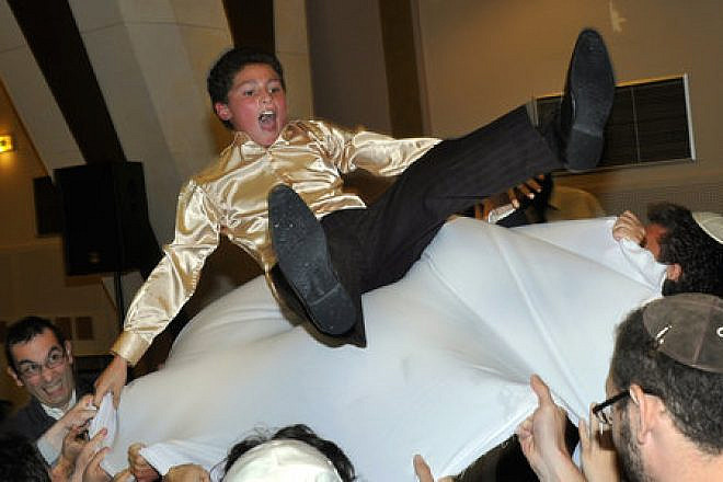 French Jews celebrate a bar mitzvah in a synagogue in Paris June 6, 2012. Credit: Serge Attal/Flash90.