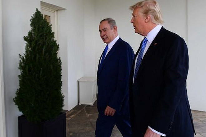 U.S. President Donald Trump and Israeli Prime Minister Benjamin Netanyahu walk along the White House colannade on Feb. 15, 2017. Credit: Avi Ohayon/GPO.