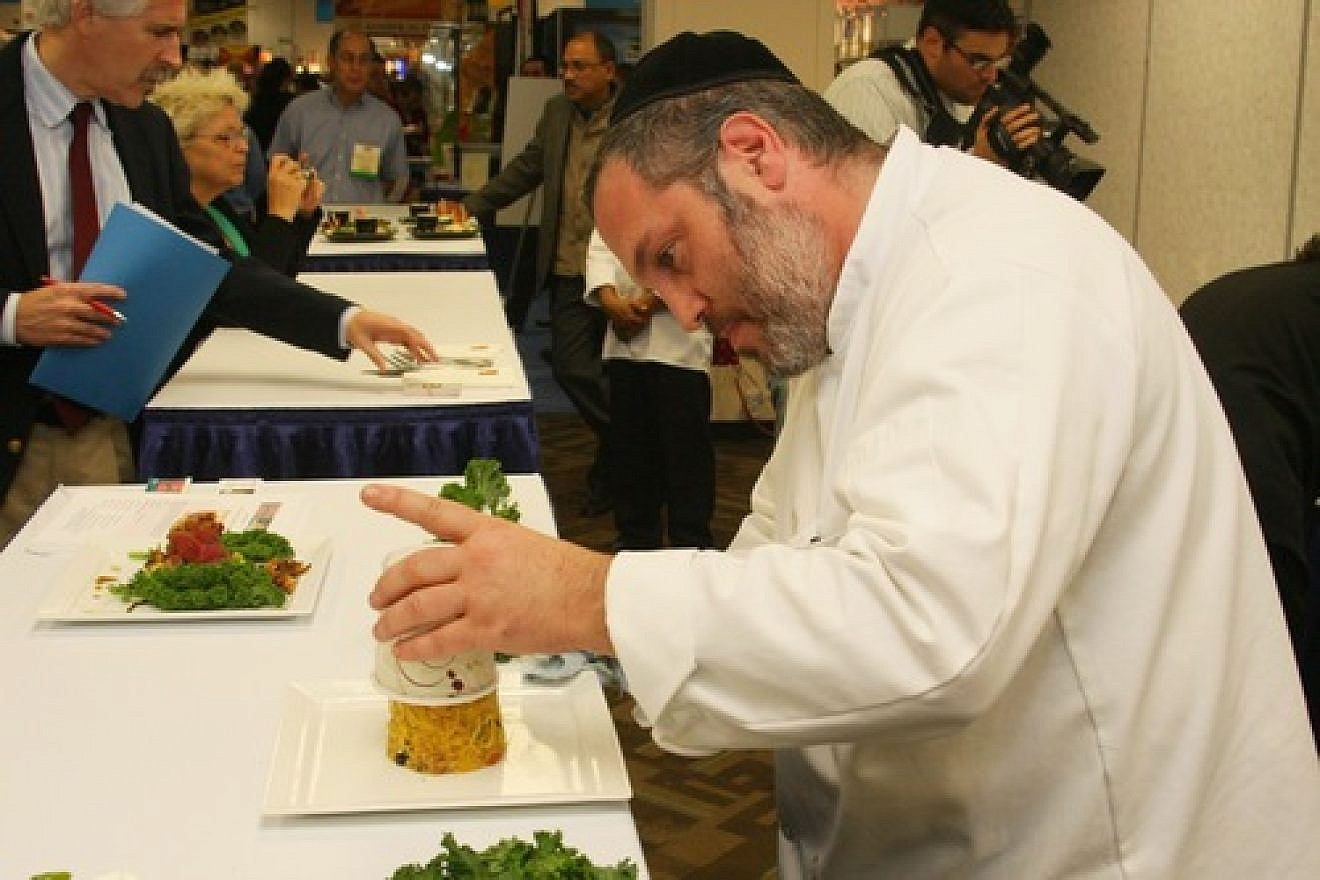 Click photo to download. Caption: An exhibitor at Kosherfest in Secaucus, NJ. Credit: Kosherfest