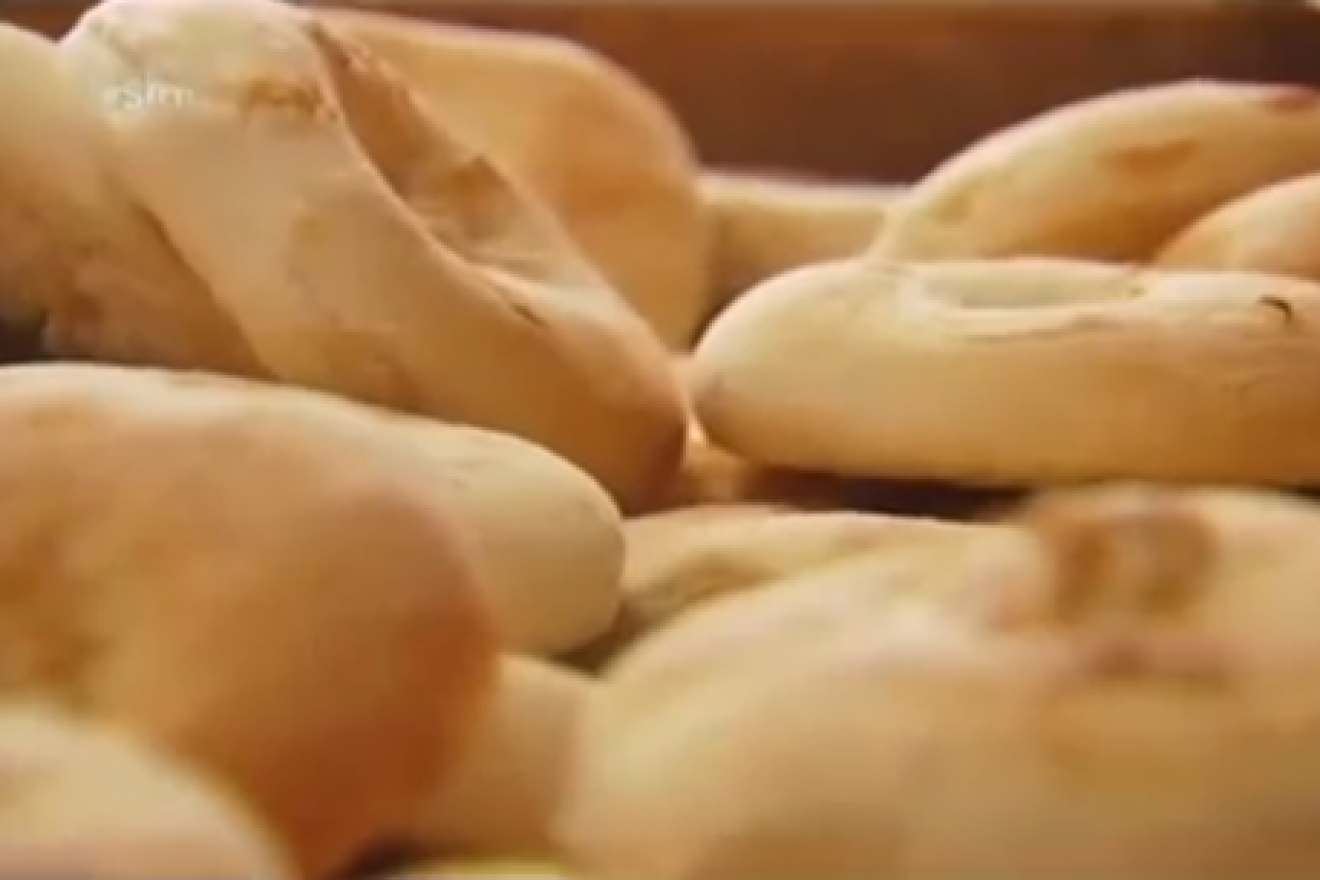 Click photo to download. Caption: Bialys from Kossar's, formerly owned by Juda Engelmayer and his wife. Credit: YouTube.