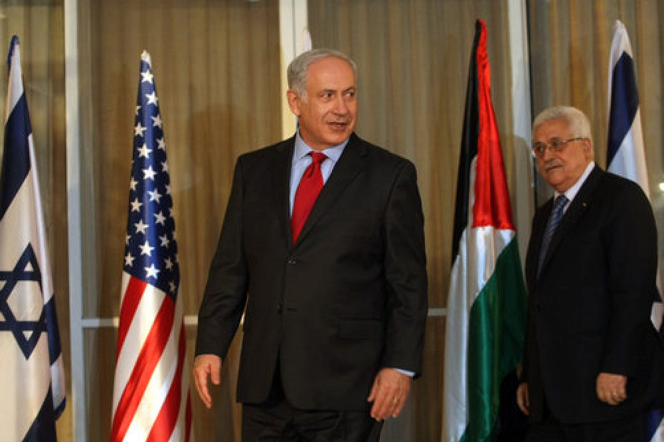 Israeli Prime Minister Benjamin Netanyahu stands with Palestinian Authority leader Mahmoud Abbas at his Jerusalem residence, September 2010. Credit: Kobi Gideon/Flash90.