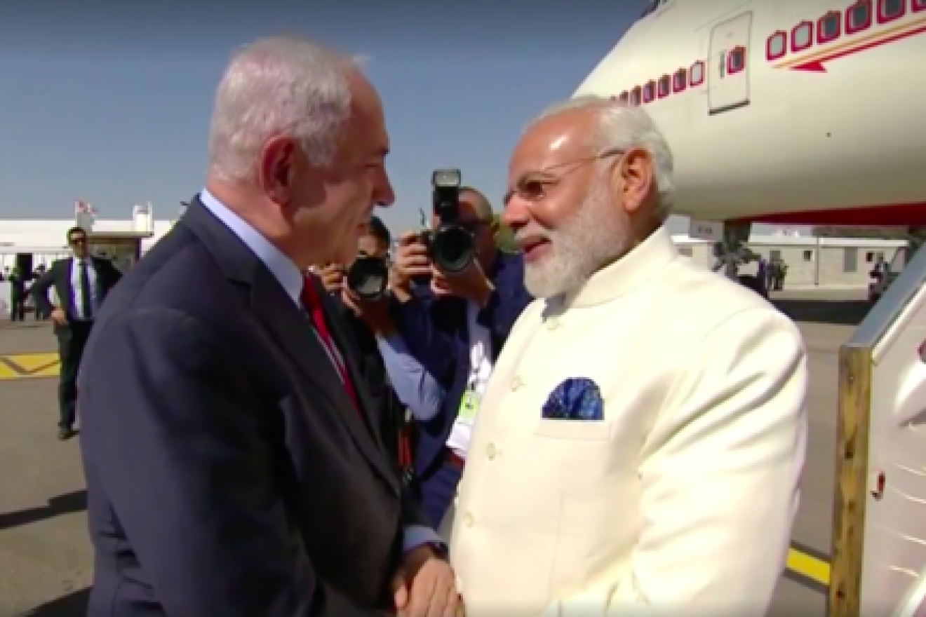 Prime Minister Benjamin Netanyahu (left) greets Indian Prime Minister Narendra Modi upon Modi's arrival in Israel Tuesday. Credit: Prime Minister Benjamin Netanyahu via Facebook.