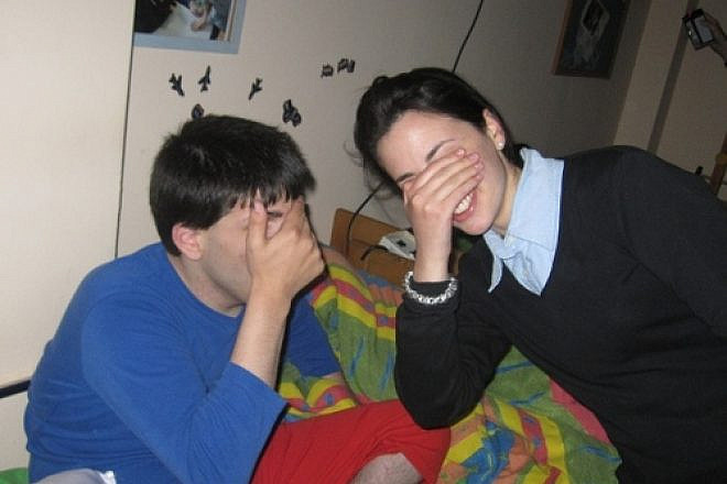 Click photo to download. Caption: A seminary student (right) participates in the "Sweet Dreams" program for the benefit of special-needs children at ALEH Jerusalem. Credit: Courtesy ALEH.
