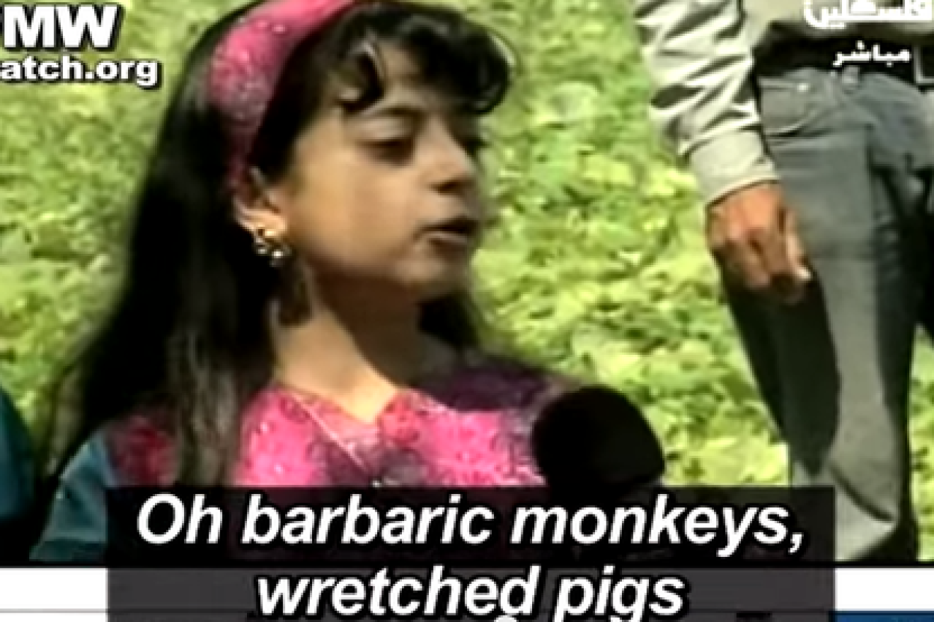 Click photo to download. Caption: A young Palestinian girl calls Jews "barbaric monkeys, wretched pigs" on Palestinian Authority TV. Credit: Palestinian Media Watch.