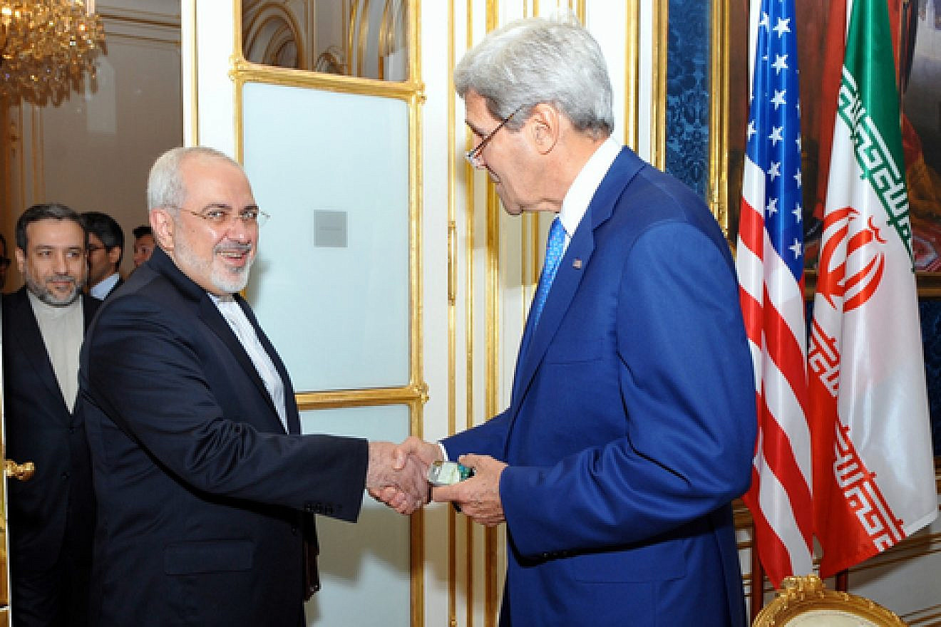 U.S. Secretary of State John Kerry with Iranian Foreign Minister Mohammad Javad Zarif as he arrives at a hotel in Vienna, Austria, on July 14, 2014, for a day of meetings about Iran's nuclear program. Credit: U.S. State Department.