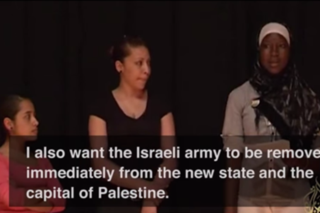 Click photo to download. Caption: During a role play exercise, a participant of Axis of Hope's "Whose Jerusalem?" workshop expresses the desire for the Israeli army "to be removed immediately from the new [Palestinian] state and the capital of Palestine." Credit: YouTube.
