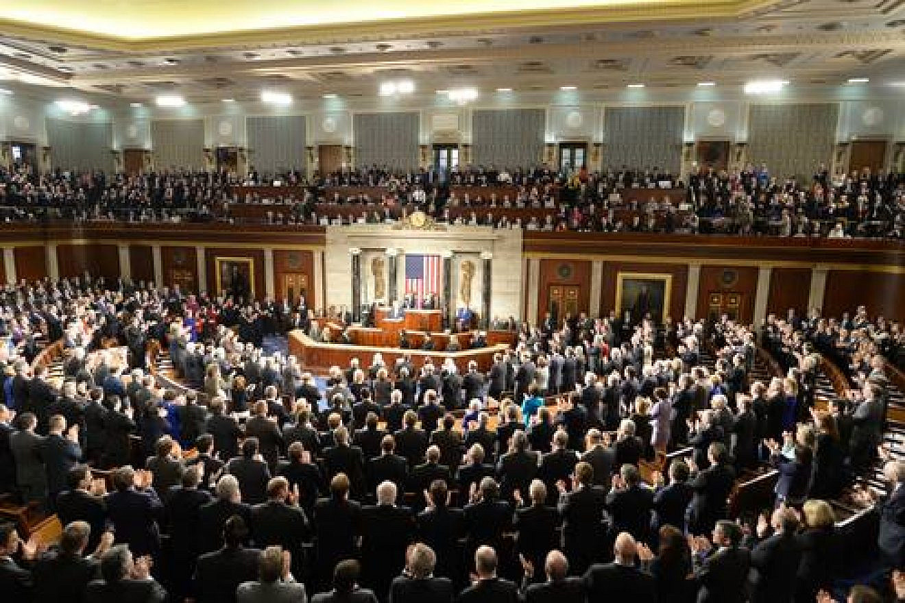 Federal legislators applaud Israeli Prime Minister Benjamin Netanyahu during his speech to a joint session of Congress. Credit: Amos Ben Gershom/GPO.