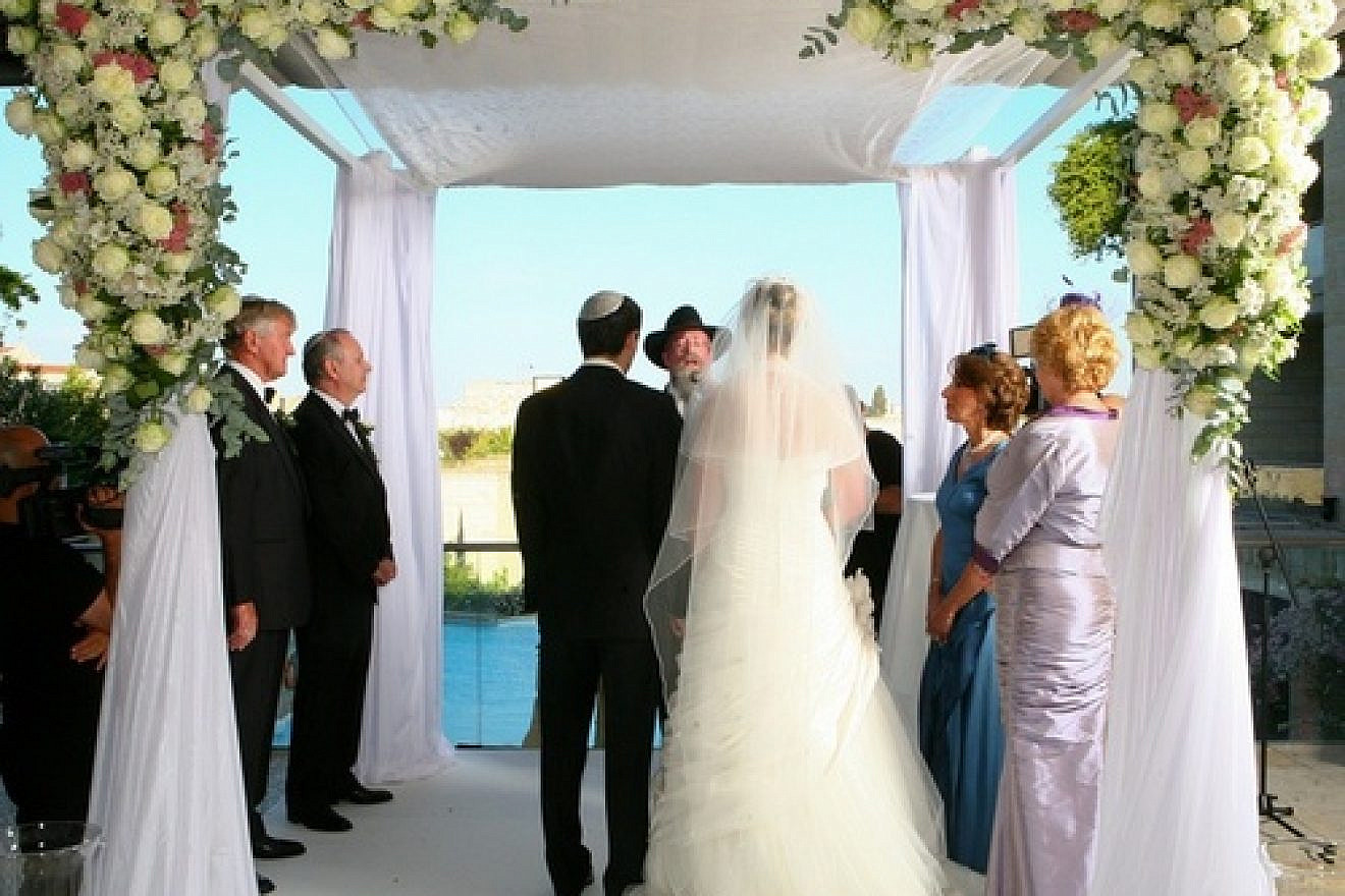 Click photo to download. Caption: A Jewish wedding in Jerusalem. Credit: Nikki Fenton.