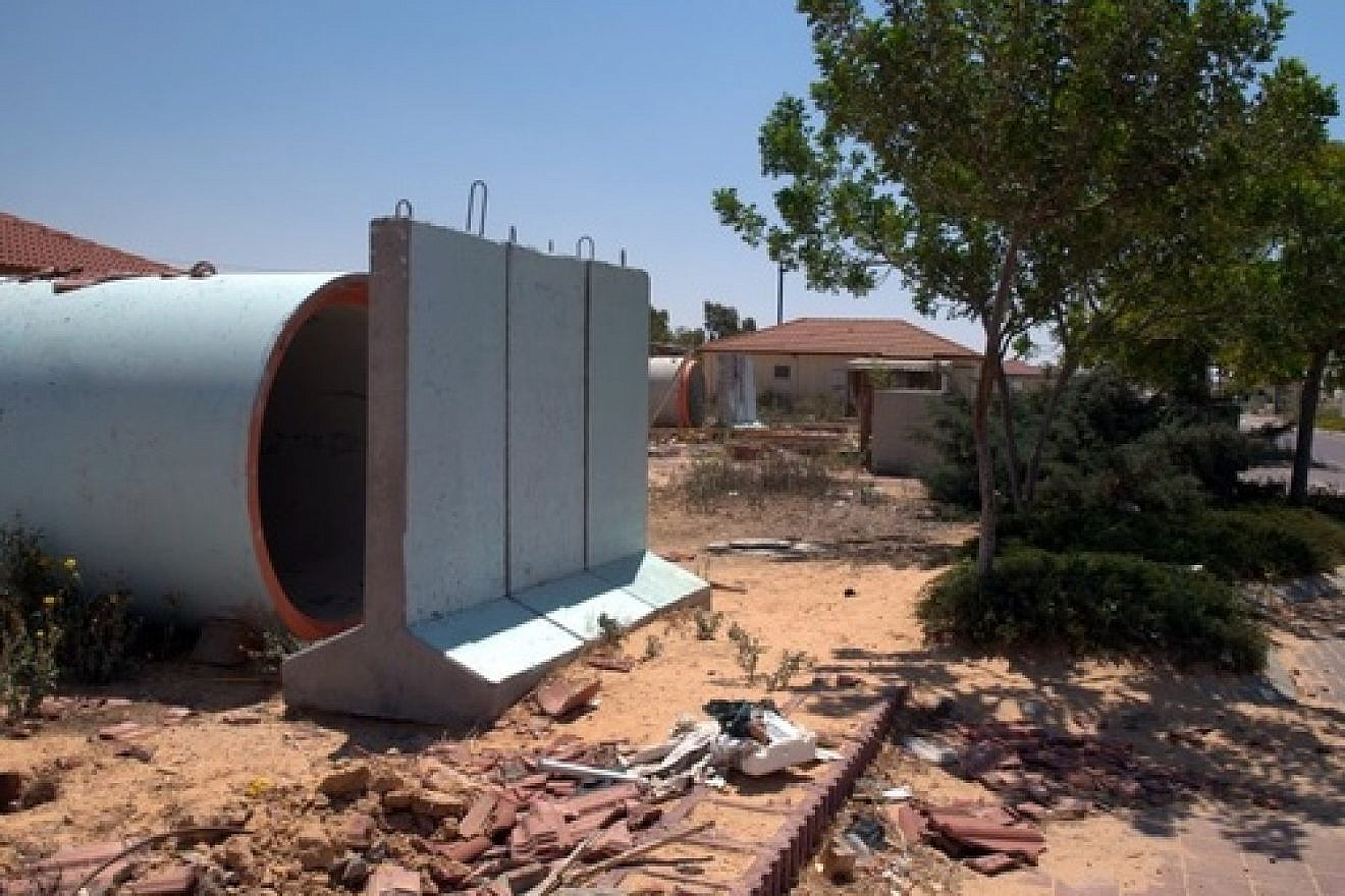 Click photo to download. Caption: A sewer pipe bomb shelter in the farming village of Yevul, alongside the Gaza Strip. Credit: B. Davidson.