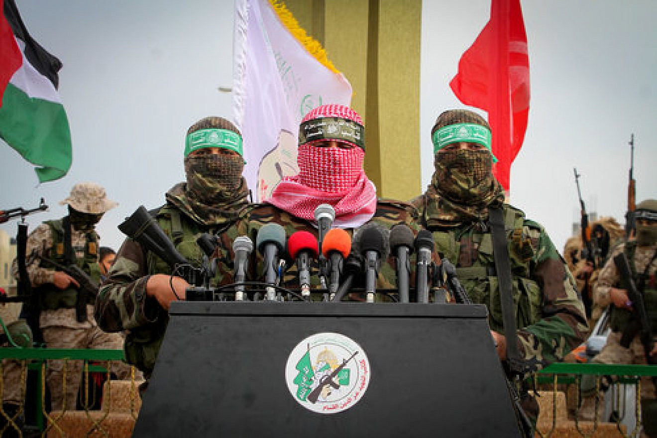 Abu Ubaida (center), a spokesman for Hamas’s military wing, speaks in the southern Gaza town of Rafah on Jan. 31, 2017. Credit: Abed Rahim Khatib/Flash90.