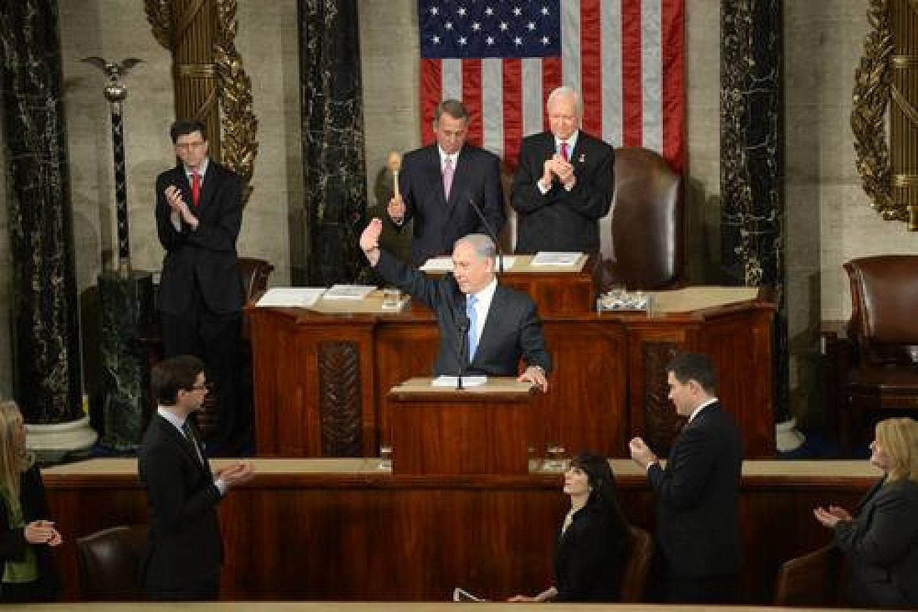 Israeli Prime Minister Benjamin Netanyahu waves to the crowd during his address to a joint session of Congress, March 3, 2015. Photo by Amos Ben Gershom/GPO.