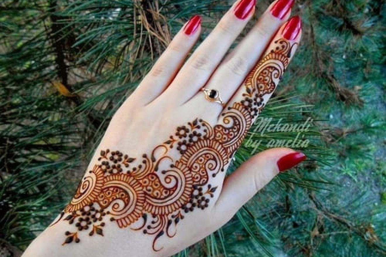 An Islamic bride's hand is decorated as part of the "henna" pre-wedding ritual. Credit: Courtesy Ibtisam Mahameed.