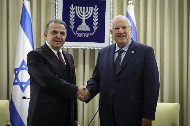 Israeli President Reuven Rivlin (right) with Kemal Okem, Turkey’s first ambassador to Israel since the restoration of those countries’ diplomatic relations, in Jerusalem Dec. 12, 2016. Credit: Isaac Harari/Flash90.