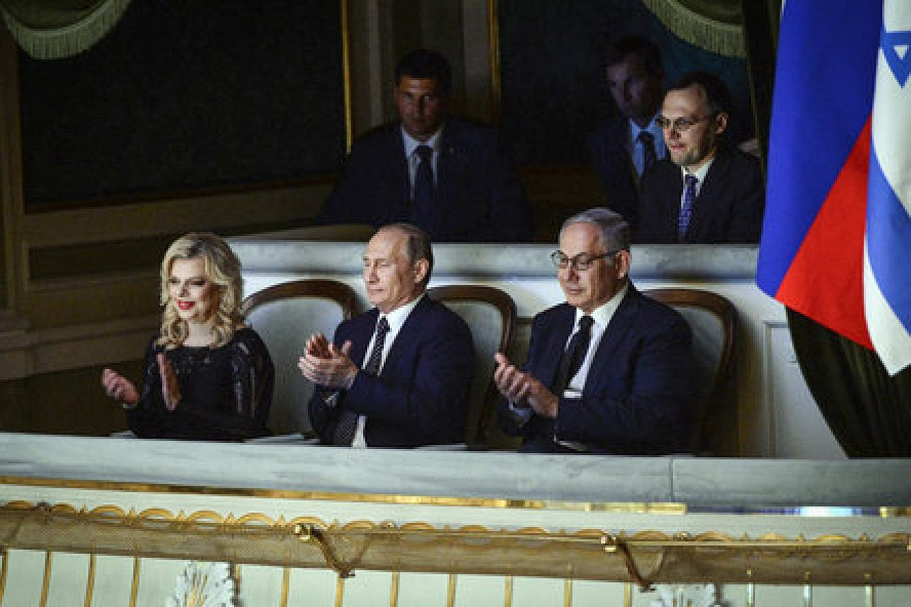 Israeli Prime Minister Benjamin Netanyahu (front right) and his wife, Sara, with Russian President Vladimir Putin (center) at the Bolshoi Theatre in Moscow June 7, 2016. Credit: Haim Zach/GPO.