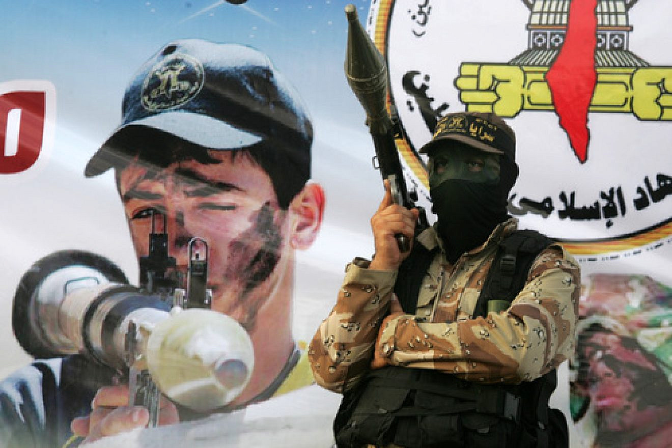 Click photo to download. Caption: A graduation ceremony at a youth military camp sponsored by the Palestinian Islamic Jihad terror group in the city of Khan Yunis in Gaza on Aug. 18, 2015. Credit: Abed Rahim Khatib/Flash90.