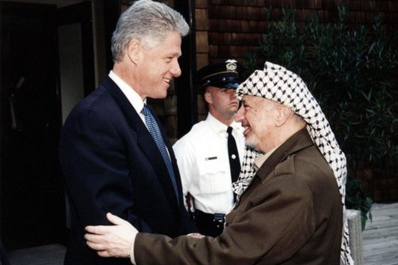 Former U.S. President Bill Clinton (left) with former Palestinian leader Yasser Arafat. In this undated handout from the Palestinian Authorities is Yasser Arafat and Bill Clinton. Arafat rejected the December 2000 “Clinton Parameters,” a State Department-drafted peace plan that called for a Palestinian state in 95 percent of the disputed territories as well as Palestinian sovereignty over the Temple Mount and other parts of eastern Jerusalem. Credit: Abed Al Rahim Al Khatib/Flash90.