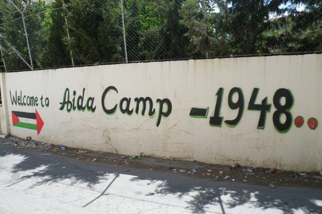 The entrance to Aida, a Palestinian refugee camp. Credit: Wikimedia Commons.