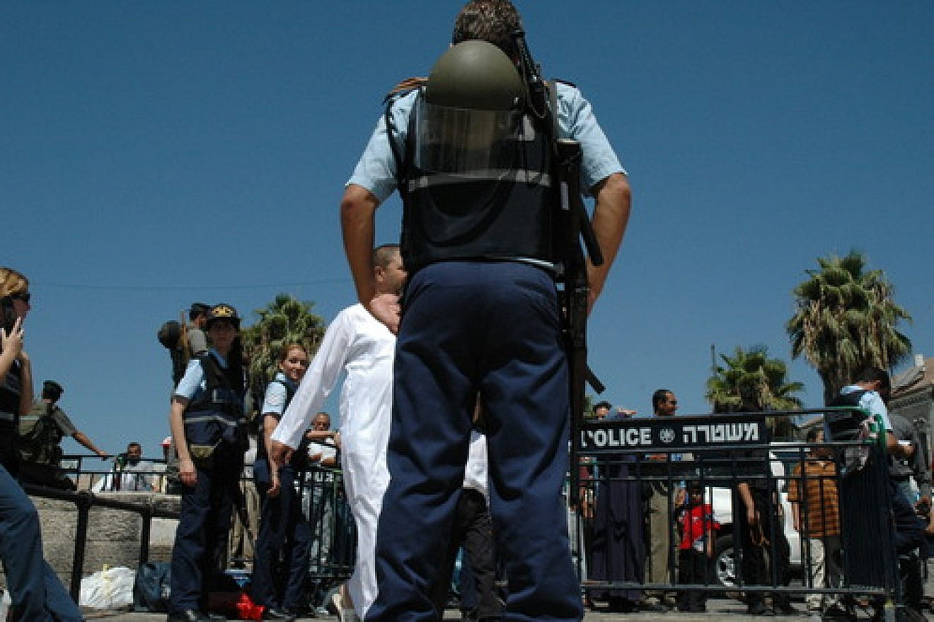 Click photo to download. Caption: Israeli police officers in Jerusalem. Credit: Justin McIntosh via Wikimedia Commons.