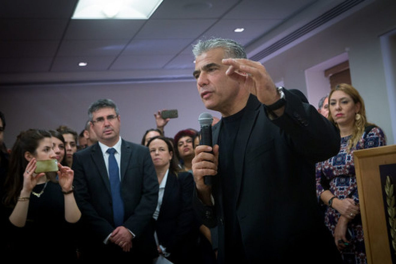 Jettisoned Israeli finance minister Yair Lapid, leader of the Yesh Atid Party, speaks during a farewell party on Dec. 4 in his honor at the Ministry of Finance in Jerusalem. Lapid and Justice Minister Tzipi Livni were dismissed from Israeli Prime Minister Benjamin Netanyahu's coalition on Dec. 2, 2017. Credit: Miriam Alster/Flash90.