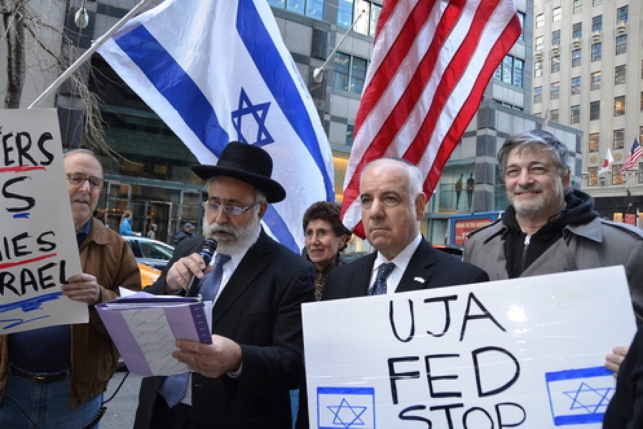 An April 8 rally in New York City against what protesters called the inclusion of "pro-BDS groups" in the annual Celebrate Israel Parade. Holding the microphone is Israeli Member of Knesset Nissim Ze’ev (Shas). Credit: Maxine Dovere.