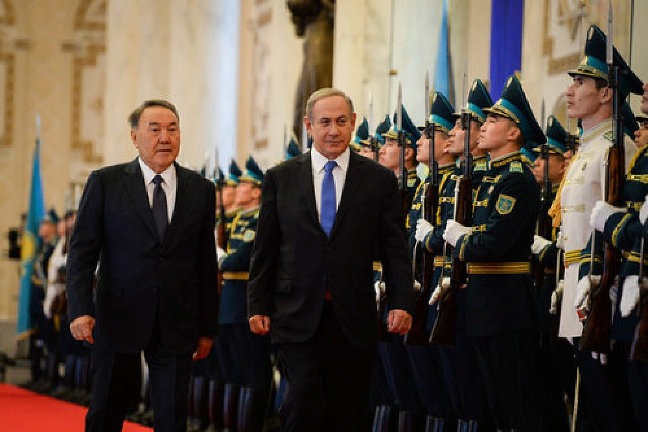 Israeli Prime Minister Benjamin Netanyahu (center) and Kazakh President Nursultan Nazarbayev (left) are welcomed at Kazakhstan’s President's Palace Dec. 14, 2016. Credit: Haim Zach/GPO.