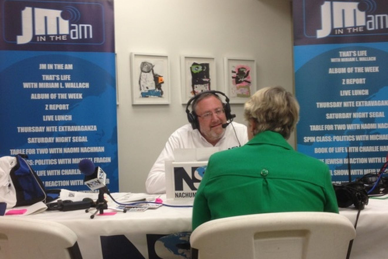 Click photo to download. Caption: On July 7, Nachum Segal, host of the "JM in the AM" radio show, interviews Houston Mayor Annise Parker at the Evelyn Rubenstein Jewish Community Center for the show's July 8 broadcast. Credit: Jacob Kamaras.