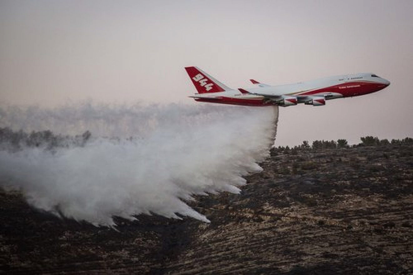 On Nov. 26, the American-dispatched Boeing 747 Supertanker plane helps extinguish a forest fire that broke out in Nataf, near Jerusalem. Credit: Hadas Parush/Flash90.