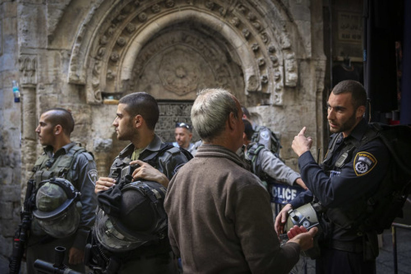 Click photo to download. Caption: Israeli Border Police officers guard the entrance for Palestinians to the Dome of the Rock and the Al-Aqsa mosque in Jerusalem's Old City on Monday, Oct. 13, 2014. Earlier that day, Palestinian rioting at Al-Aqsa forced Israeli security forces to limit the number of Palestinians allowed to enter the Temple Mount compound. Credit: Hadas Parush/Flash90.