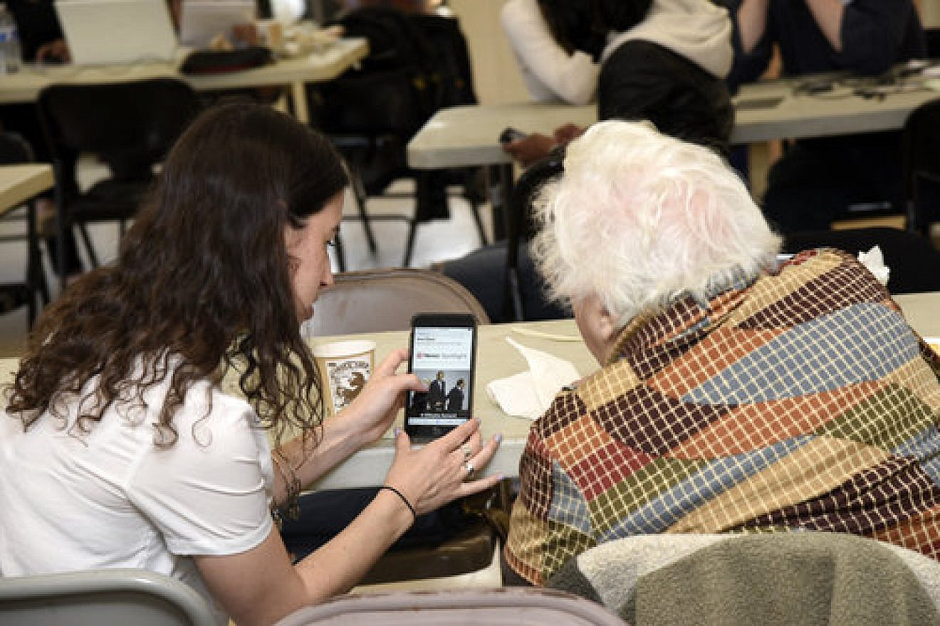A picture that is included in “Smart Money,” a newly released study intended to help the Jewish community navigate the high-tech world. Credit: Lewis Kassel, courtesy of Moishe House.