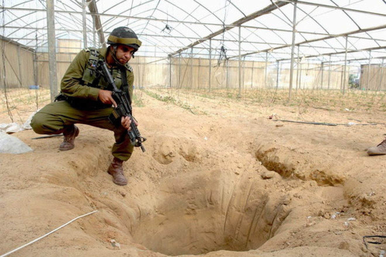 An Israeli soldier pictured in 2006 at a tunnel uncovered during an Israeli counterterrorism operation designated to thwart weapons-smuggling from Egypt to Gaza. Credit: Israel Defense Forces.