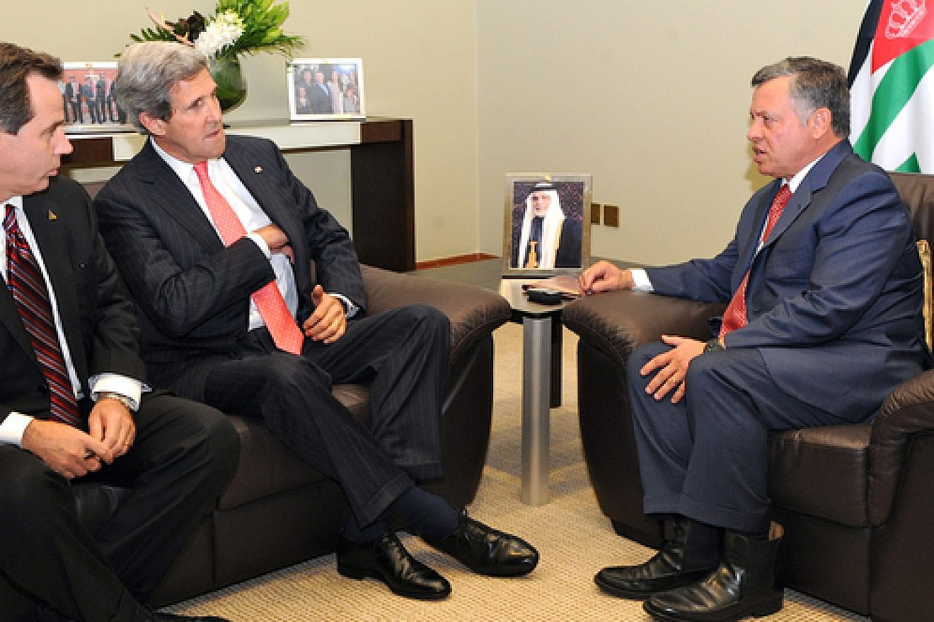U.S. Secretary of State John Kerry, accompanied by U.S. Ambassador to Jordan Stuart E. Jones, meets with King Abdullah II of Jordan before a session of the World Economic Forum at the Dead Sea on May 26, 2013. Credit: U.S. State Department.