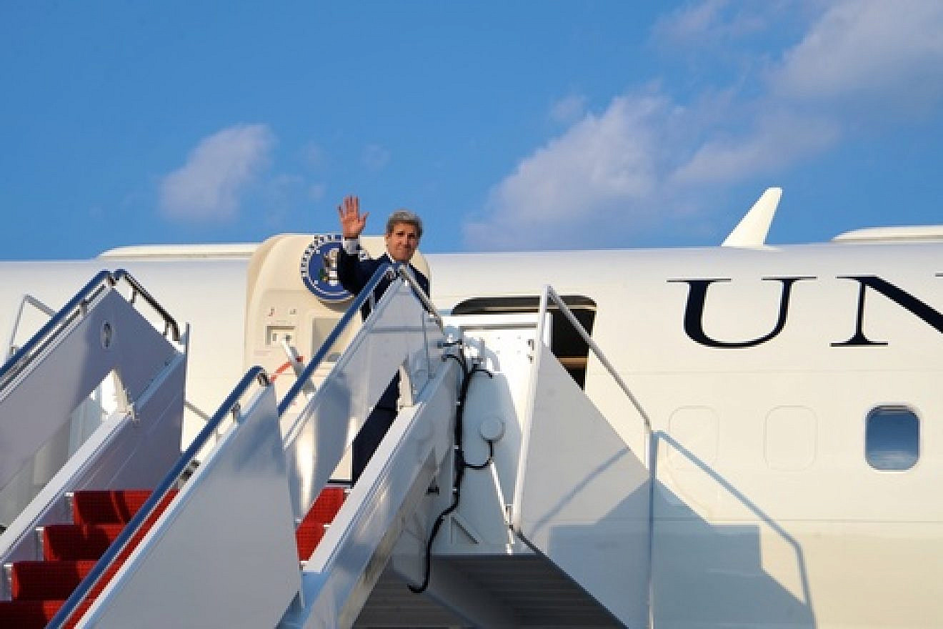 U.S. Secretary of State John Kerry  boards his plane at Andrews Air Force Base for a flight to Amman on July 15, 2013. Credit: U.S. State Department.