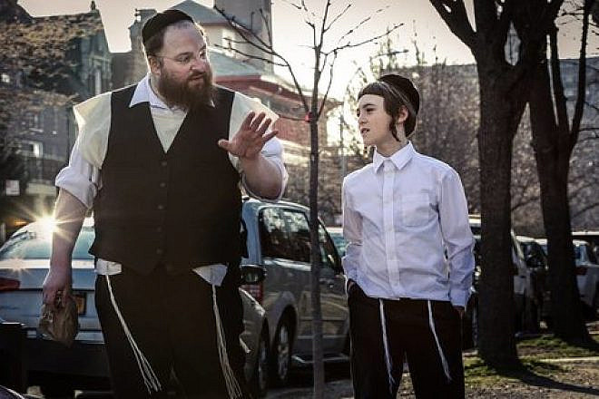 Chassidic father Menashe and his son, Rieven, in the film “Menashe.” Credit: Federica Valabrega.