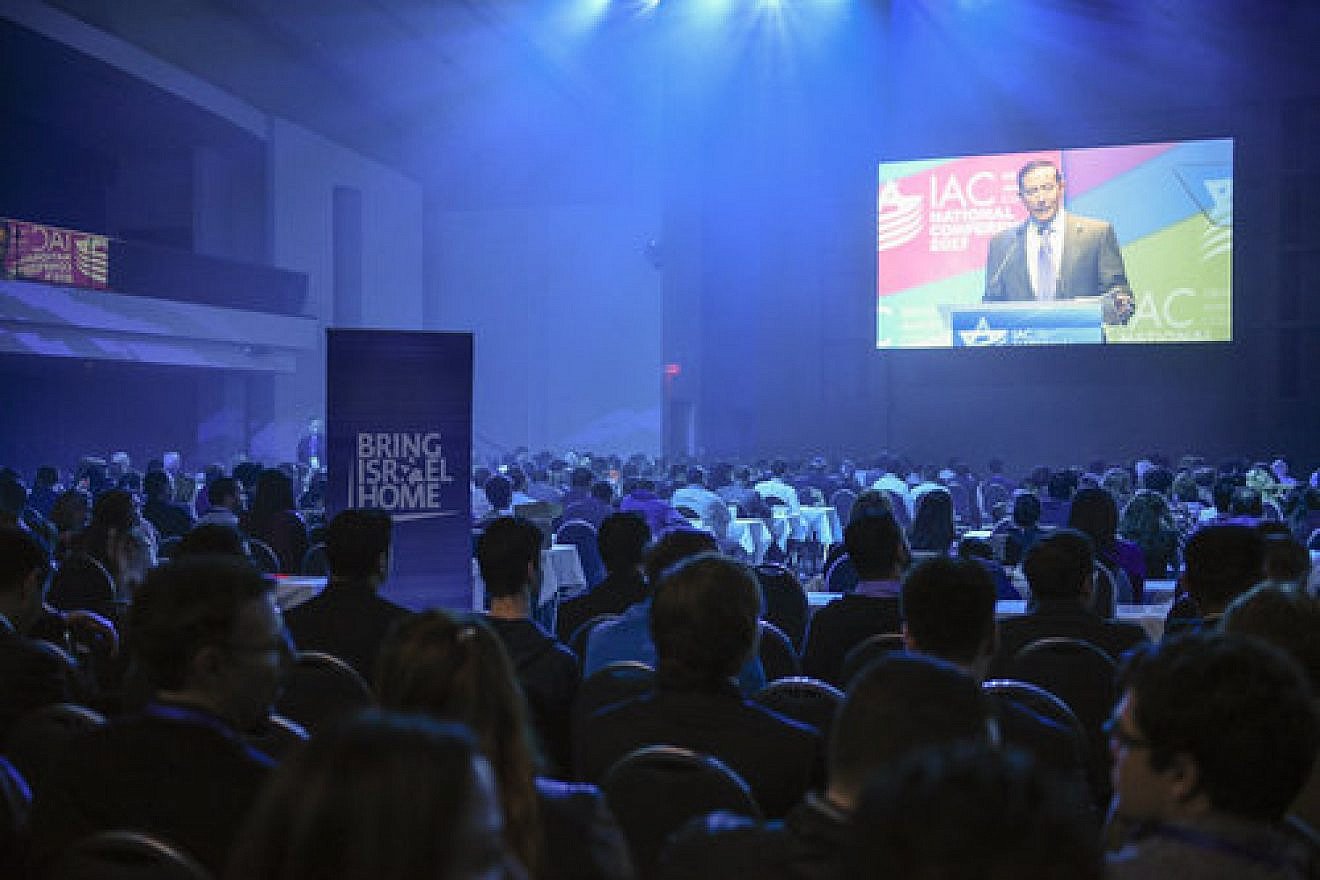 Attendees of the Israeli-American Council's (IAC) national conference listen to remarks by Adam Milstein, IAC's chairman, earlier this month in Washington, D.C. Credit: Alycia Kravitz.