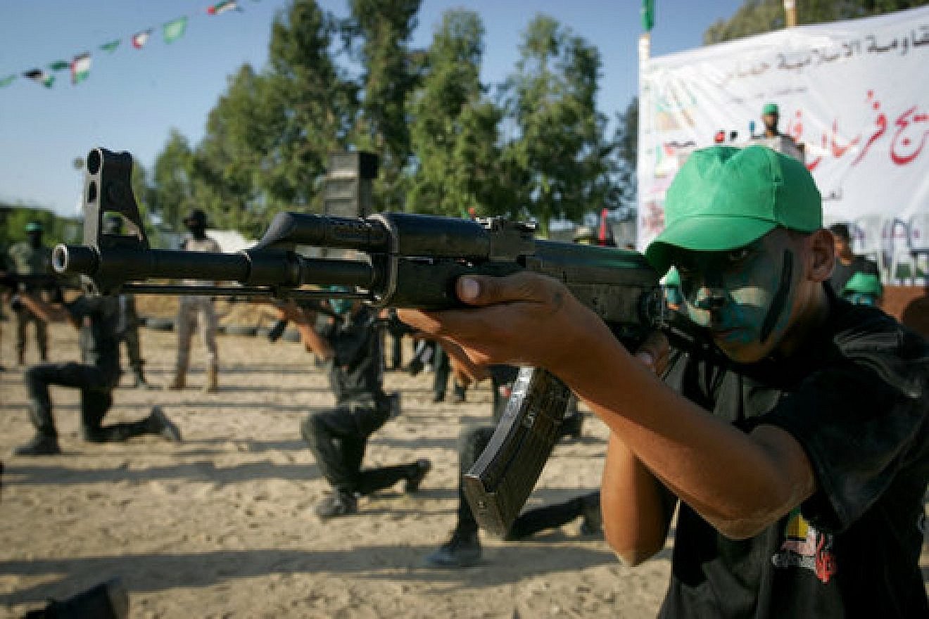 Palestinian youths participate in a graduation ceremony of a military-style camp organized by the Hamas terror group in Gaza on Aug. 18, 2017. Credit: Abed Rahim Khatib/Flash90.