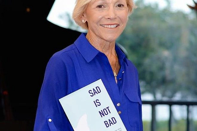 Harriet Vogel with her book, “Sad Is Not Bad: It’s How We Grieve After We’ve Loved.” Vogel met her current love online at age 73—after grieving sufficiently to be open to someone new following the death of her husband. Credit: Courtesy of Harriet Vogel.