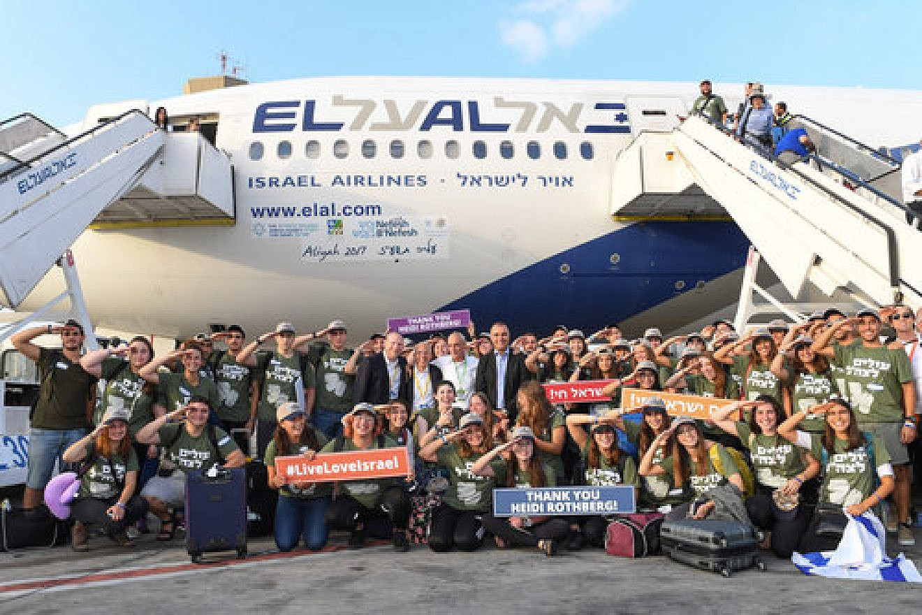 Future IDF soldiers are pictured upon their arrival in Israel Aug. 15 on a flight chartered by the Nefesh B’Nefesh aliyah agency. Credit: Shahar Azran.