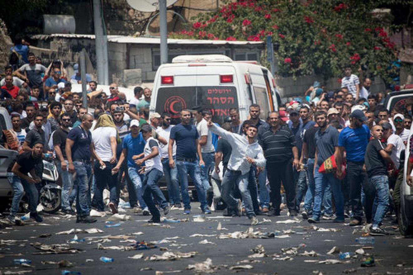 Palestinian rioters in eastern Jerusalem, near the Old City, protest Israel’s new Temple Mount metal detectors following Friday prayers July 21, 2017. Credit. Yonatan Sindel/Flash90.
