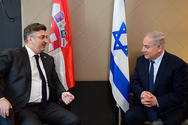 Israeli Prime Minister Benjamin Netanyahu and Croatian Prime Minister Andrej Plenković meet at the World Economic Forum in Davos, Switzerland, on Jan. 25 2018. Credit: Amos Ben-Gershom/GPO.