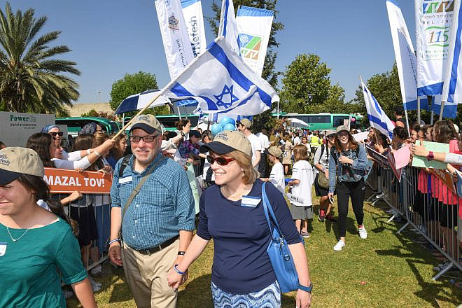 New immigrants arrive in Israel on July 4, 2017, on a flight chartered by the Nefesh B’Nefesh aliyah agency. Credit: Shahar Azran/Nefesh B’Nefesh.