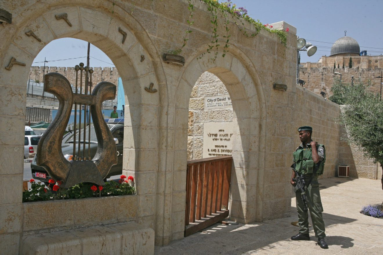 An Israeli soldier stands in the City of David historical site located next to the Arab neighborhood of Silwan. Photo by Matanya Tausig / FLASH90.