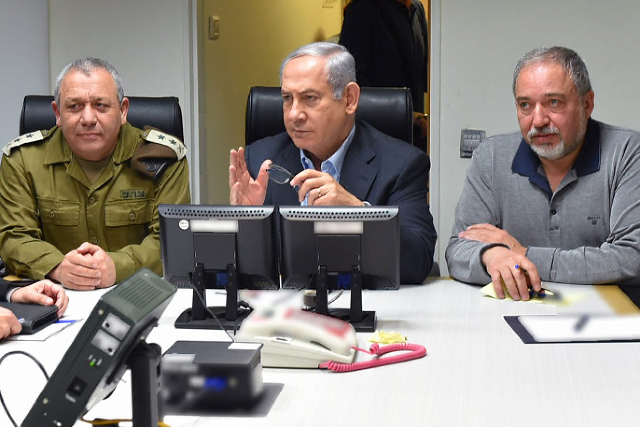 Israeli Prime Minister Benjamin Netanyahu, Defense Minister Avigdor Lieberman and IDF Chief of Staff Gadi Eizenkot attend a security council meeting at IDF Headquarters, following the crash of an F-16 plane on Feb. 10, 2018. Photo by Ariel Hermony/Ministry of Defense.